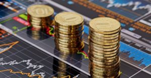 monety w stosach na wykresie